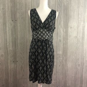 Sleeveless black and white dress.